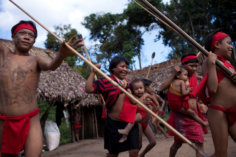 FILE PHOTO: Yanomami Indians dance at the community of Irotatheri