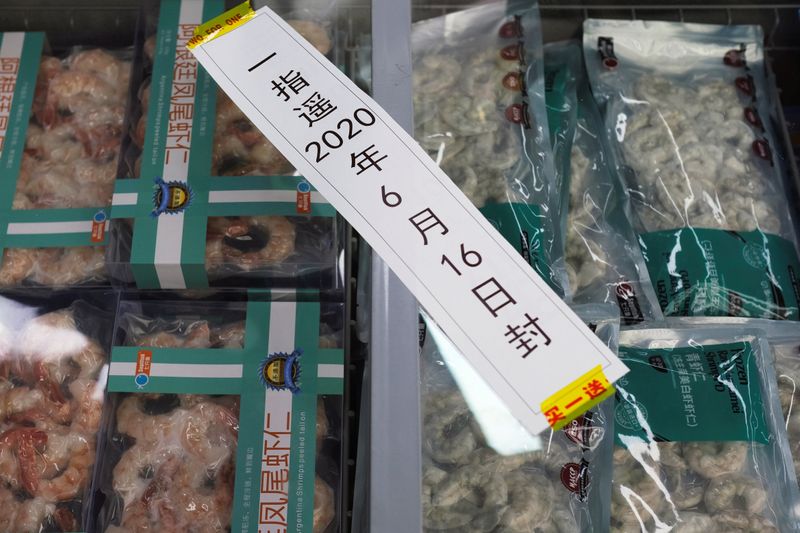 Frozen seafood products made of imported shrimps are seen inside a sealed freezer at a supermarket in Beijing