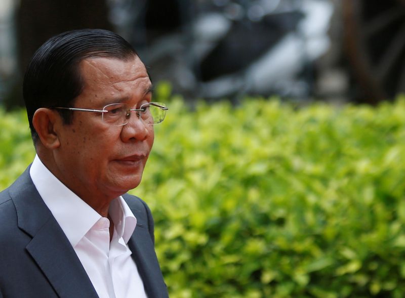 Cambodia's Prime Minister Hun Sen arrives to attend a World Teacher's Day event in Phnom Penh