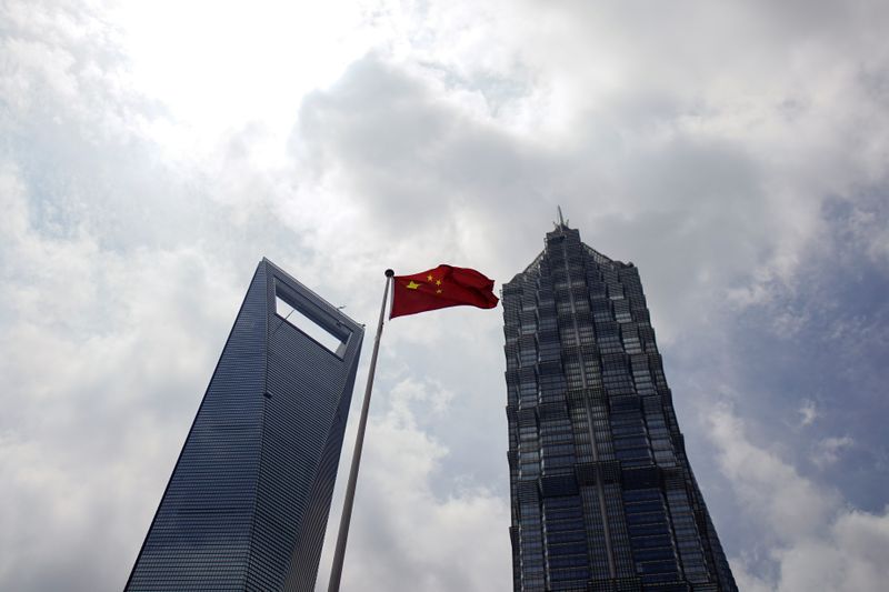 A Chinese flag is pictured at Lujiazui financial district in Pudong, Shanghai