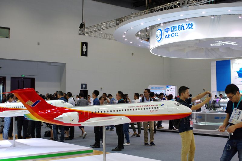 FILE PHOTO: A model of China's ARJ21 aircraft by COMAC is displayed at Aviation Expo China 2017 in Beijing