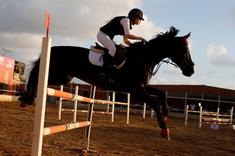 Gaza horse riders compete again as coronavirus curbs ease