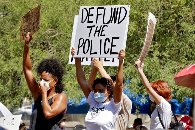 Protesters clash over ‘defund the police’ meaning