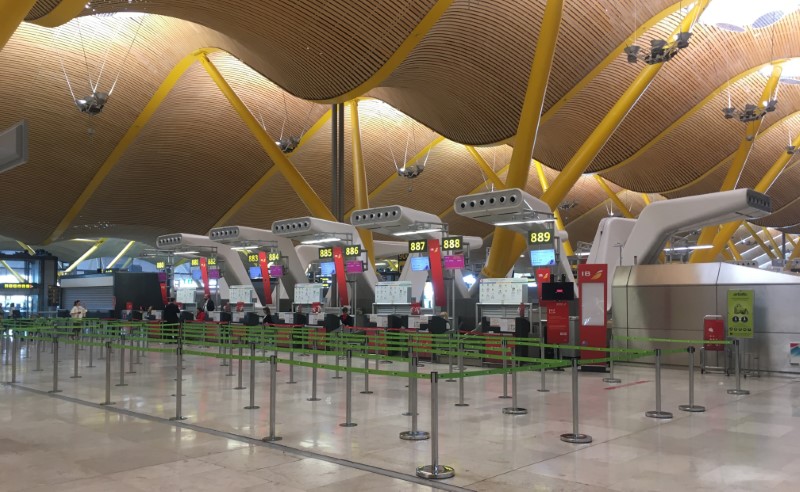FILE PHOTO: Empty Iberia check-in counters are seen at Madrid's Adolfo Suarez Barajas Airport