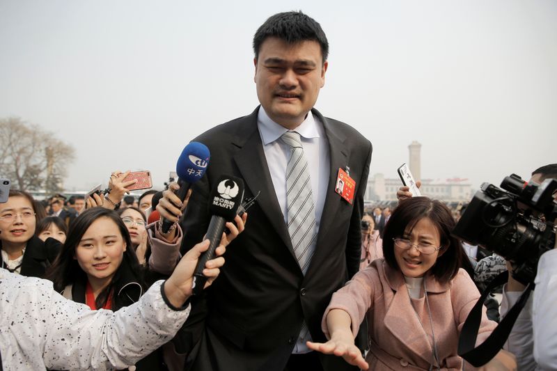Yao Ming arrives for the opening session of the Chinese People's Political Consultative Conference (CPPCC) at the Great Hall of the People in Beijing