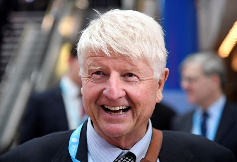 FILE PHOTO: Stanley Johnson, father of Boris Johnson, walks through the venue of the Conservative Party Conference in Birmingham