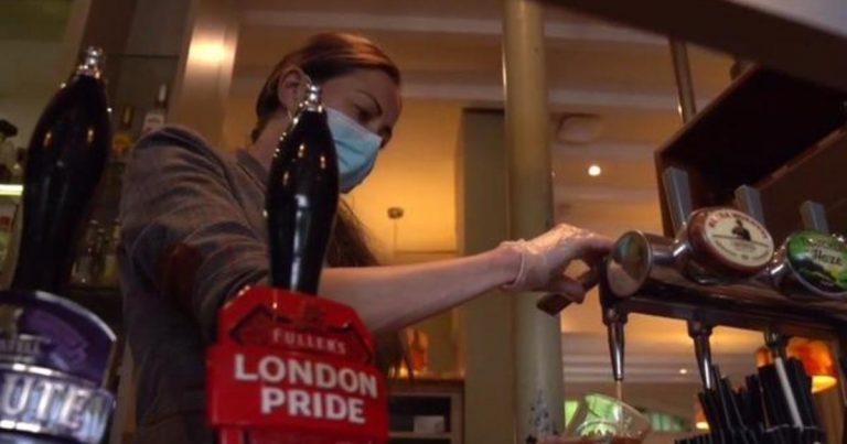 England reopens pubs and other businesses as infection rates drop