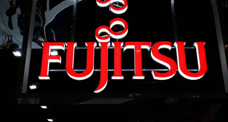 FILE PHOTO: The logo of Fujitsu is pictured at a CEATEC exhibition in Japan