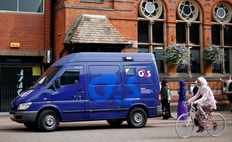 File photo of a G4S security van parked outside a bank in Loughborough