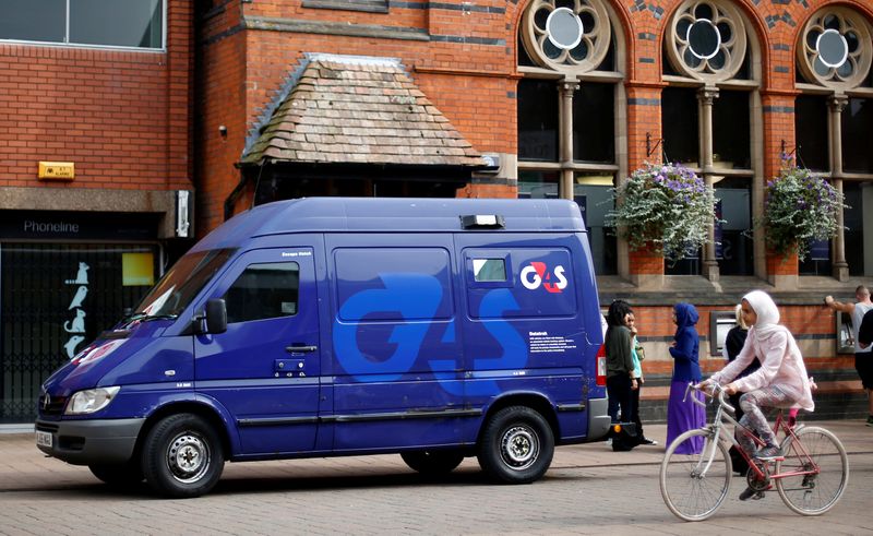 FILE PHOTO: A G4S security van parked outside a bank in Loughborough