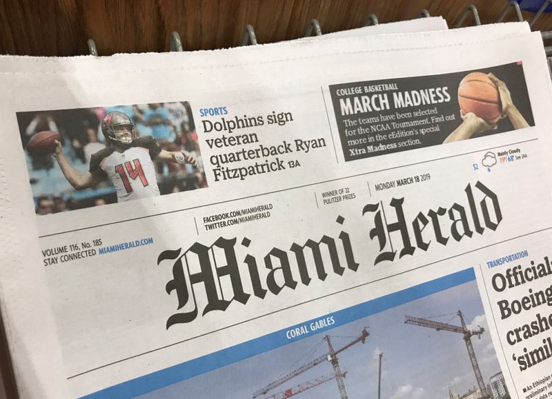 A copy of the Miami Herald is shown on a supermarket rack in Doral
