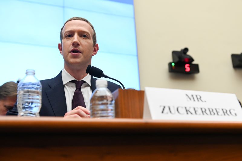 Facebook Chairman and CEO Zuckerberg testifies at a House Financial Services Committee hearing in Washington