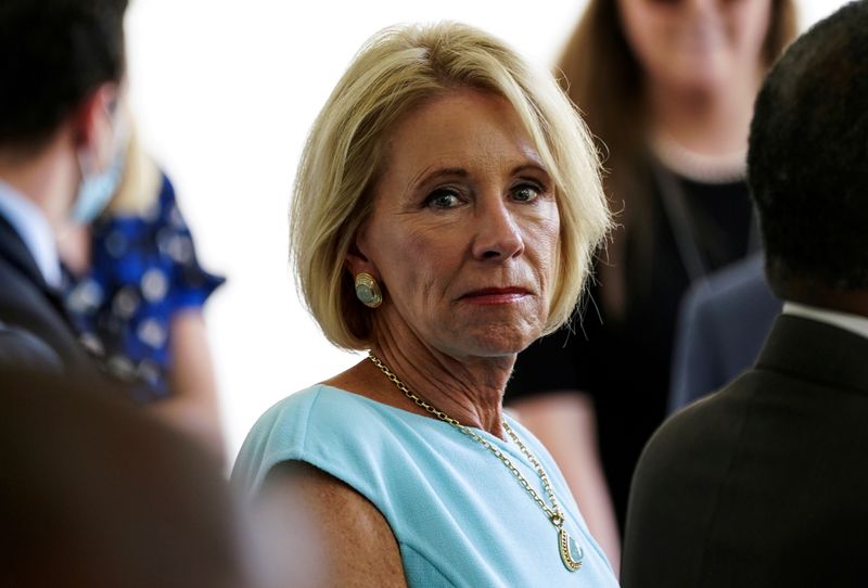 FILE PHOTO: Education Secretary Devos attends signing ceremony at the White House in Washington