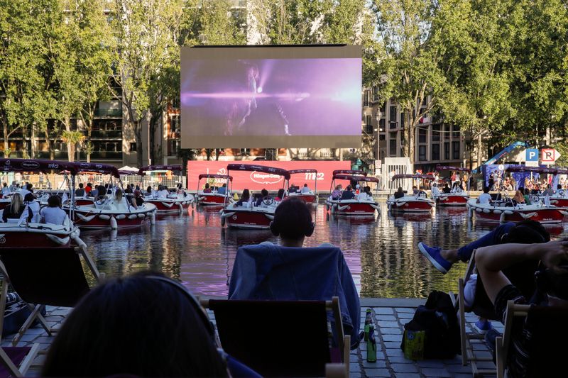 Floating cinema with socially-distant electric boats in Paris