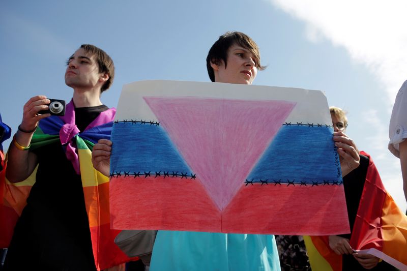 People take part in the LGBT (lesbian, gay, bisexual, and transgender) community rally 