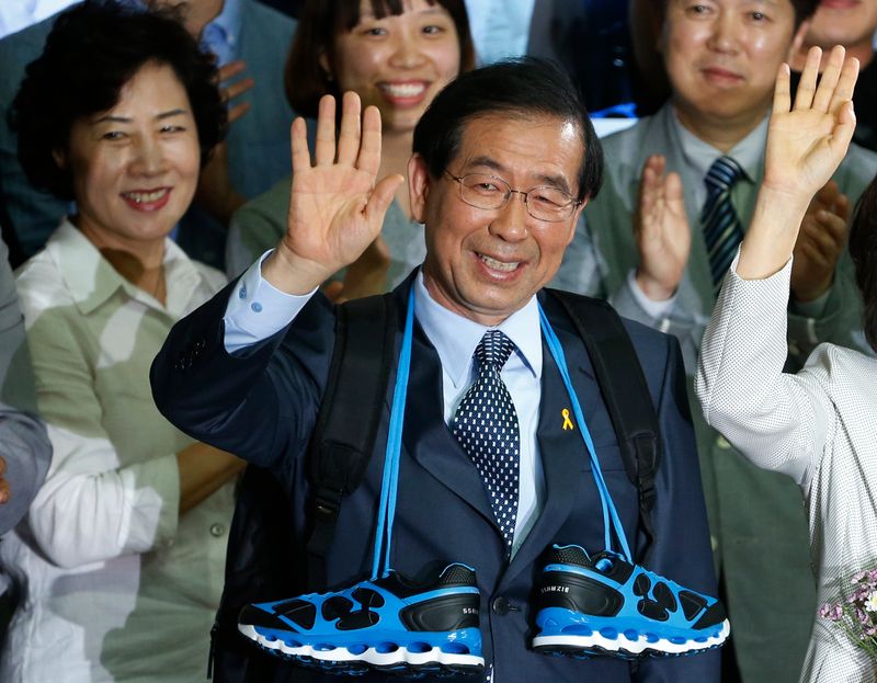 FILE PHOTO: Park Won-soon, candidate for mayor of Seoul, celebrates his victory in Seoul