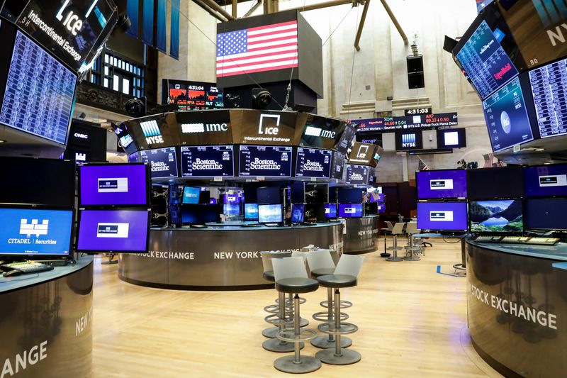 A nearly empty trading floor is seen as preparations are made for the return to trading at the NYSE in New York