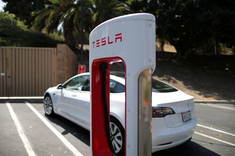 FILE PHOTO: A Tesla SuperCharger station is seen in Los Angeles