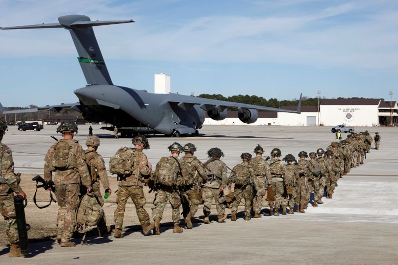 U.S. Army paratroopers of an immediate reaction force from the 82nd Airborne Division prepare to leave Fort Bragg