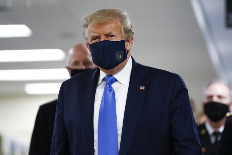 Trump wears coronavirus mask publicly for first time during visit to Walter Reed military hospital