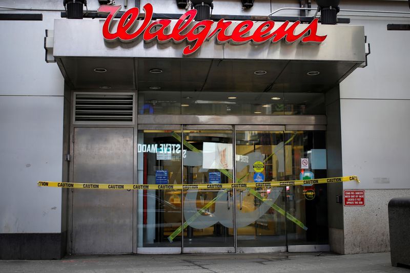 FILE PHOTO: A shuttered Walgreens pharmacy is seen during the coronavirus outbreak in Times Square in Manhattan in New York