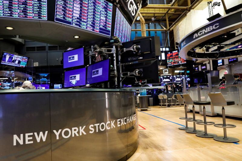 A nearly empty trading floor is seen as preparations are made for the return to trading at the NYSE in New York