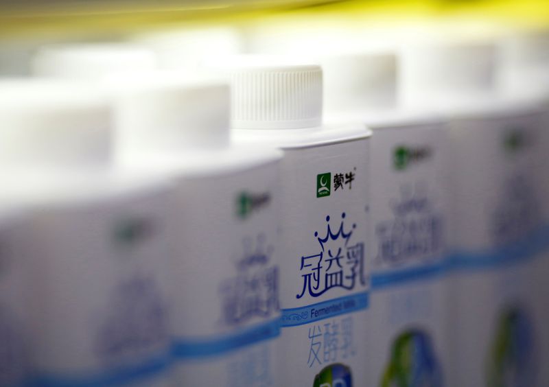 FILE PHOTO: China Mengniu milk products are displayed at a supermarket in Beijing