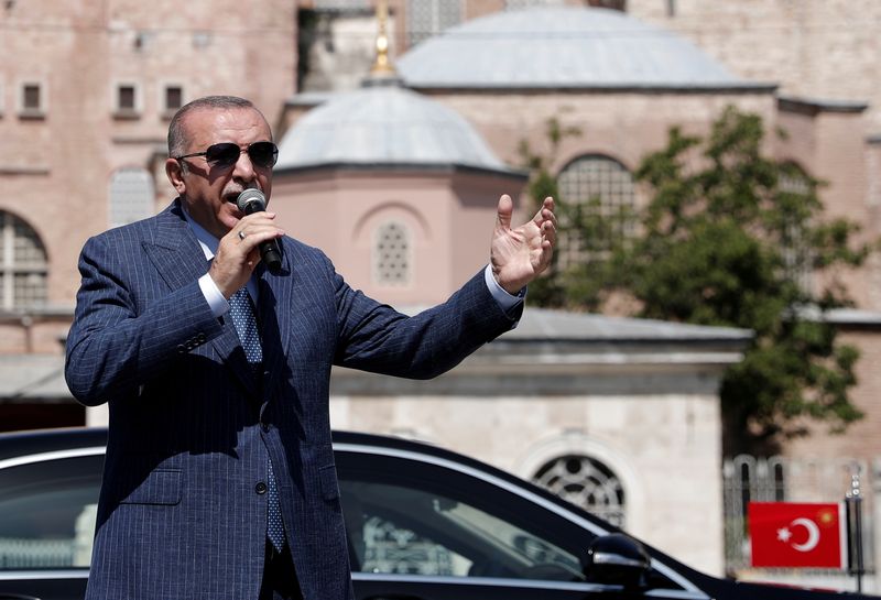 FILE PHOTO: Turkish President Erdogan talks to the media after attending Friday prayers at Hagia Sophia Grand Mosque in Istanbul