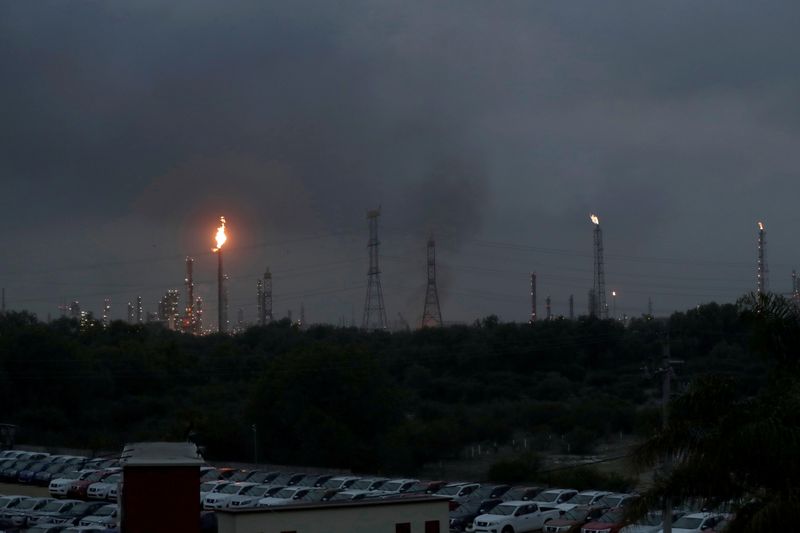 Excess natural gas is burnt, or flared, from Mexican state-owned Pemex's Tula oil refinery, located adjacent to the Tula power plant belonging to national power company Comisión Federal de Electricidad, or CFE, in Tula de Allende