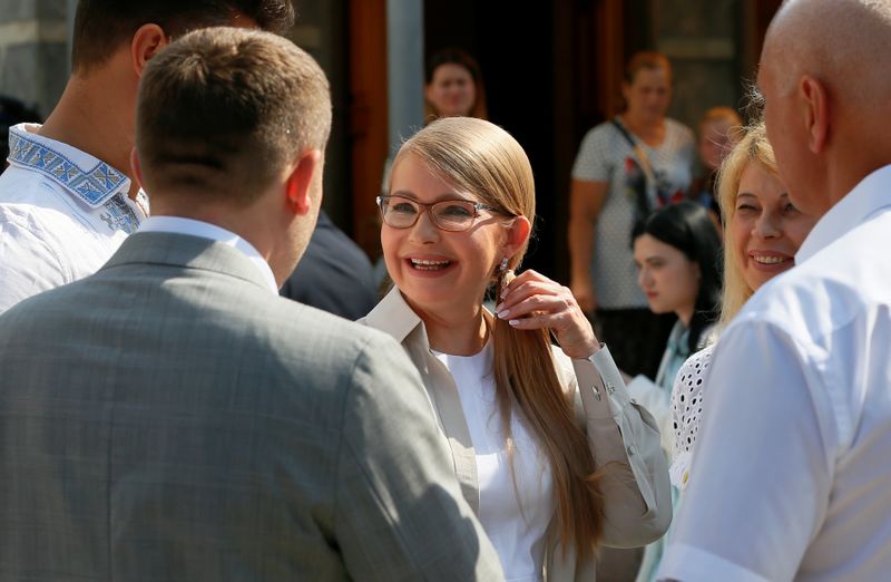 Batkivshchyna party leader Tymoshenko visits a polling station during Ukraine's parliamentary election in Kiev
