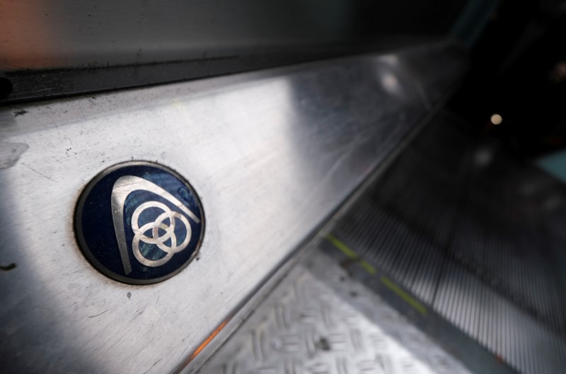 FILE PHOTO: The logo of German steelmaker ThyssenKrupp AG is seen on an escalator at Frankfurt's main railways station in Frankfurt