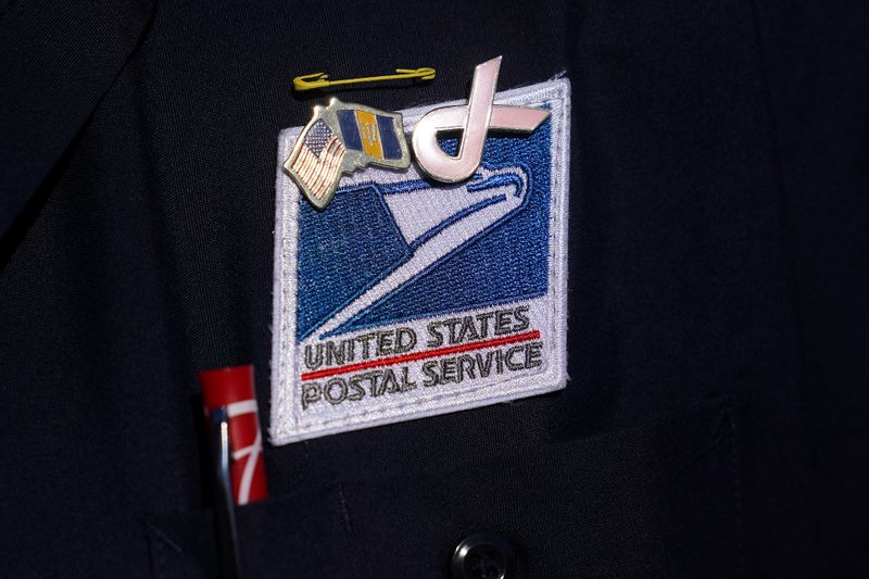 USPS badge is pictured during a news conference about the postal service in New York City