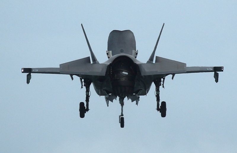 FILE PHOTO: A U.S. Marine Corps F-35B Joint Strike Fighter hovers in an aerial display during a media preview of the Singapore Airshow in Singapore