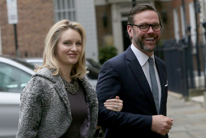 FILE PHOTO: James Murdoch, the son of media mogul Rupert Murdoch, and his wife Kathryn Hufschmid arrive for a reception to celebrate the wedding between Rupert Murdoch and former supermodel Jerry Hall which took place on Friday, in London