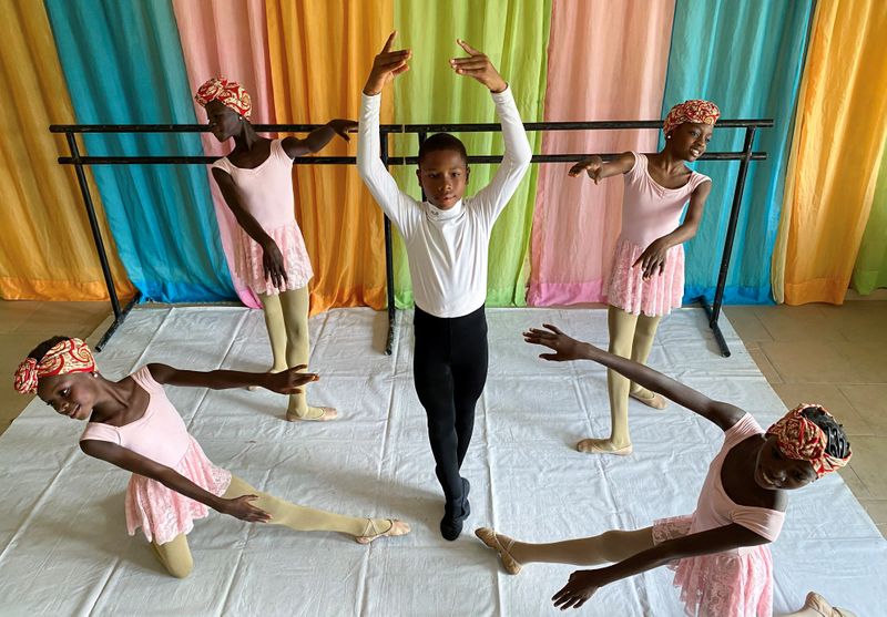 Anthony Mmesoma Madu, an 11-year-old ballet dancer, poses during a rehearsal with other students at the Leap of Dance Academy in Lagos
