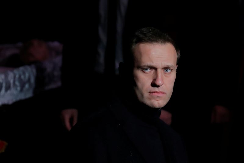 FILE PHOTO: Russian opposition leader Navalny pays respect to human rights activist Alexeyeva in Moscow