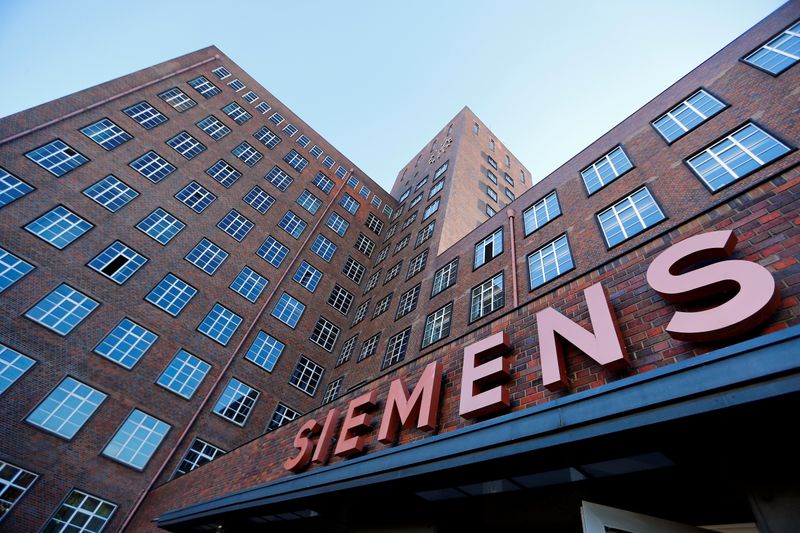 FILE PHOTO: The Siemens logo is seen on a building in Siemensstadt in Berlin