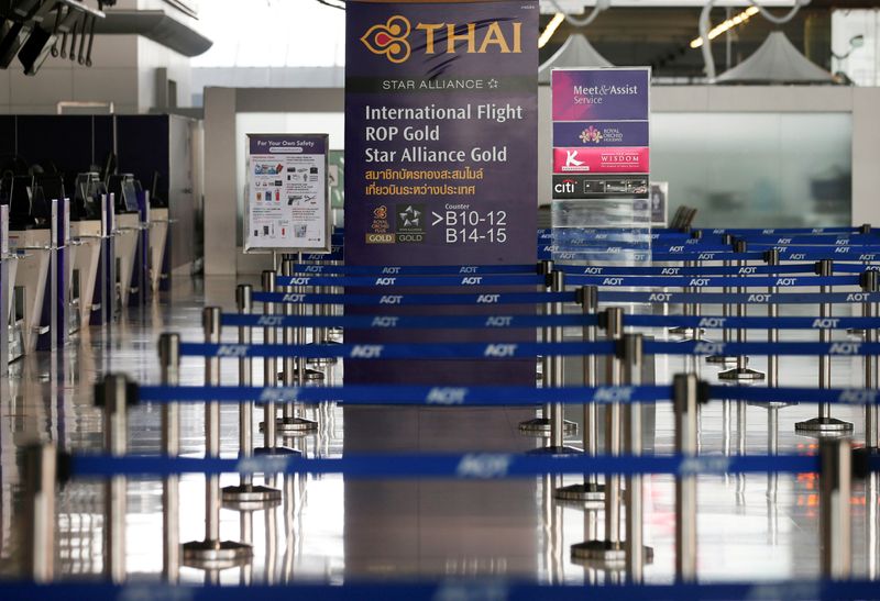 FILE PHOTO: Empty lines are seen at Thai Airways counters in Suvarnabhumi Airport in Bangkok