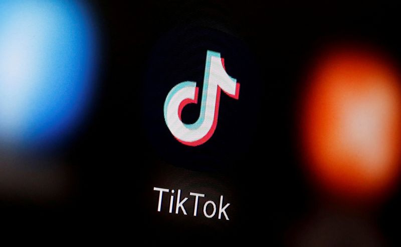 FILE PHOTO: A TikTok logo is displayed on a smartphone