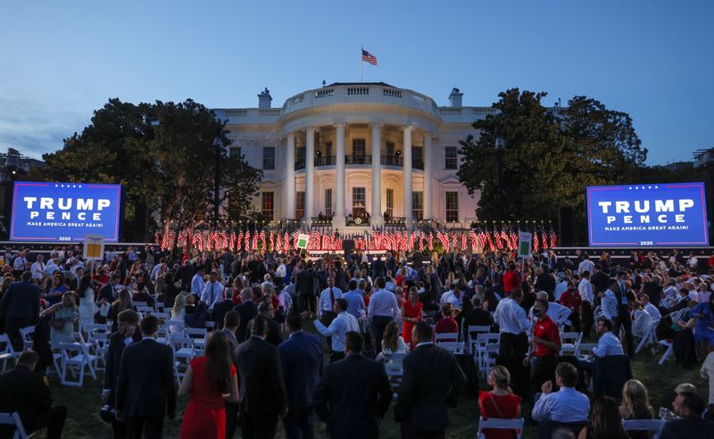 A crowd waits for U.S. President Donald Trump to deliver his acceptance speech as the 2020 Republican presidential nominee on South Lawn of the White House in Washington