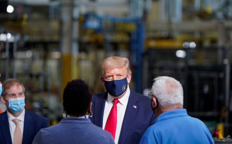 U.S. President Donald Trump tours a Whirlpool Corporation washing machine factory in Clyde, Ohio