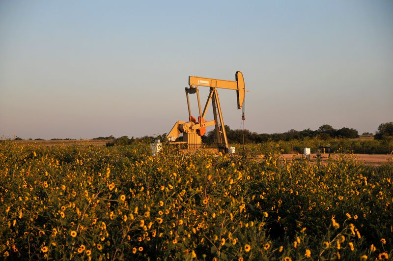 A pump jack operates at a well site leased by Devon Energy Production Company near Guthrie, Oklahoma