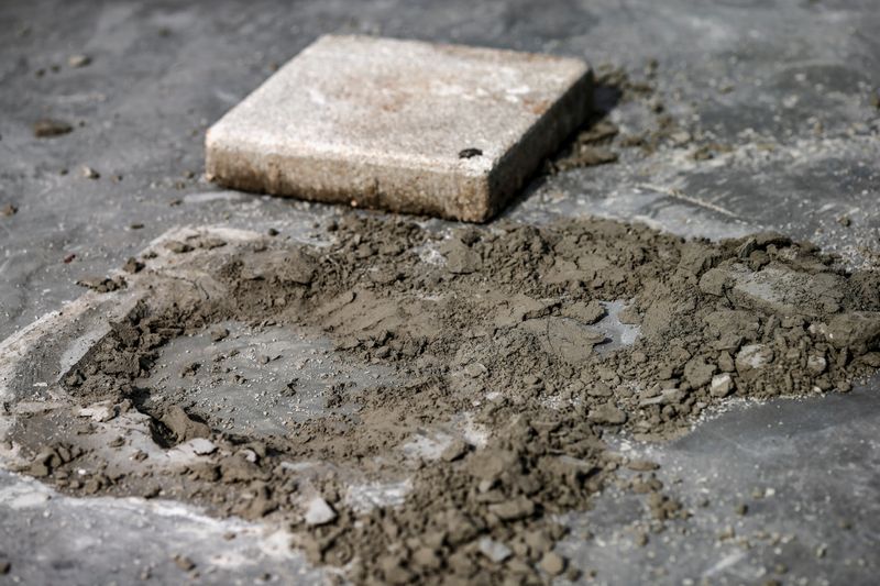 A close-up view of the spot where a plaque placed by Thai pro-democracy protesters near the Grand Palace in Bangkok that declared that Thailand belongs to the people and not the king, is seen after the plaque was removed according to police, in Bangkok