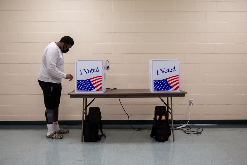 FILE PHOTO: People cast their ballot during early voting in South Carolina