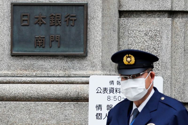 A policeman stands guard in front of the headquarters of Bank of Japan amid the coronavirus disease (COVID-19) outbreak in Tokyo
