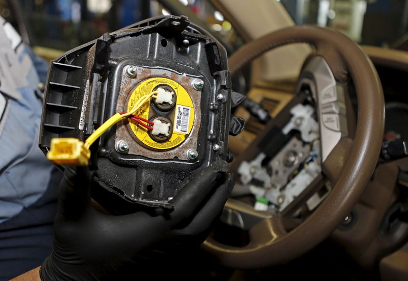 A recalled Takata airbag inflator removed it from a Honda Pilot at the AutoNation Honda dealership service department in Miami Florida