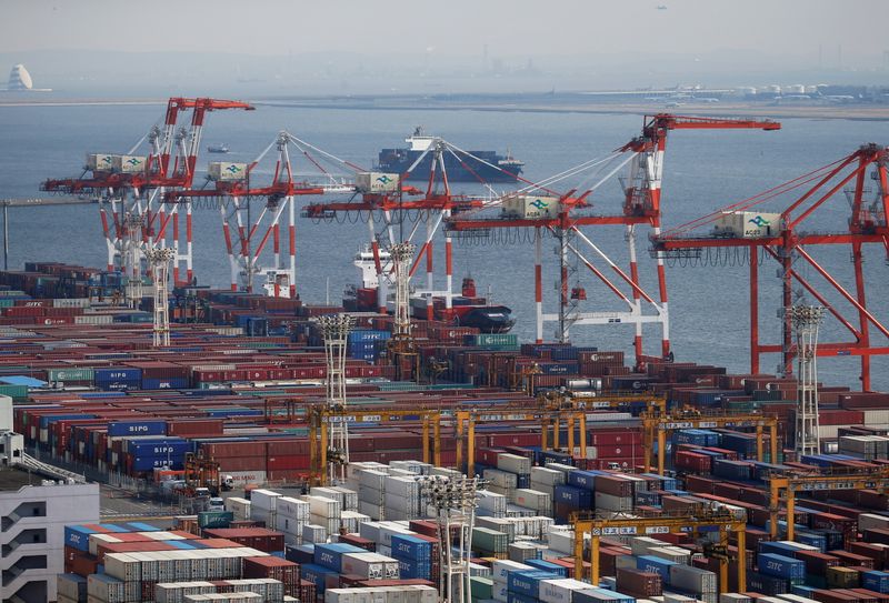 FILE PHOTO: Shipping containers are seen at a port in Tokyo, Japan