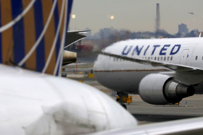 FILE PHOTO: A United Airlines passenger jet taxis at Newark Liberty International Airport