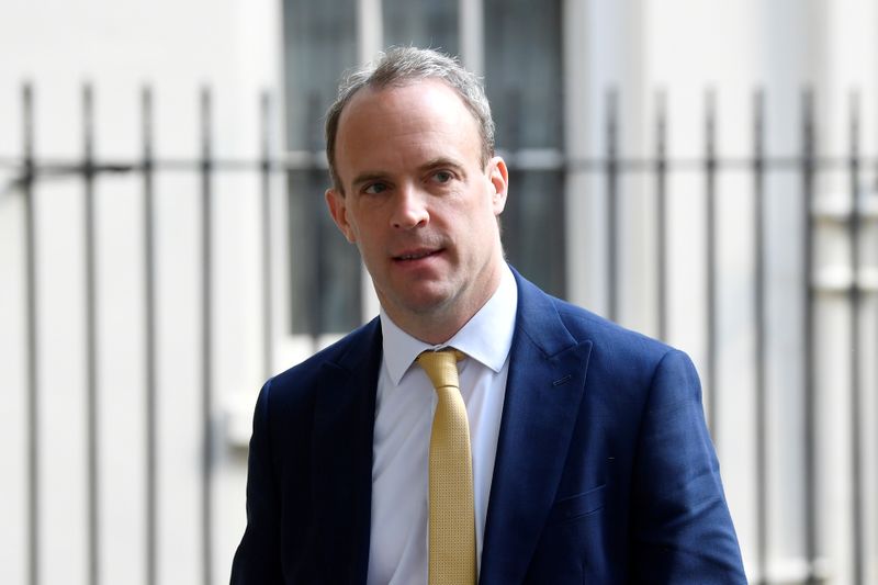 FILE PHOTO: Britain's Secretary of State for Foreign affairs Dominic Raab leaves Downing Street in London, following the outbreak of the coronavirus disease (COVID-19), London