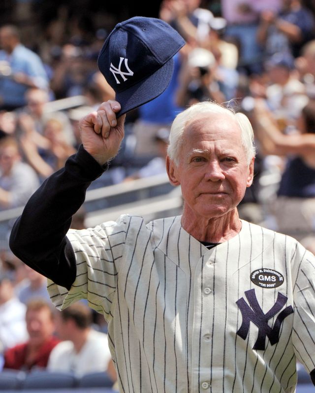 FILE PHOTO: Hall of Fame member Whitey Ford tips his cap during introductions for the New York Yankees 64th Old-Timers' Day game in New York